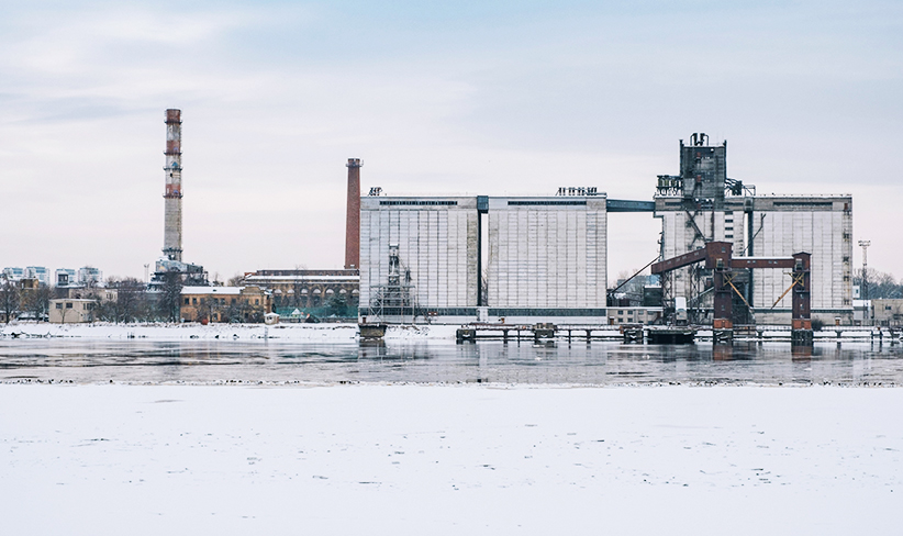 Industrial plant in a cold, snowy environment.