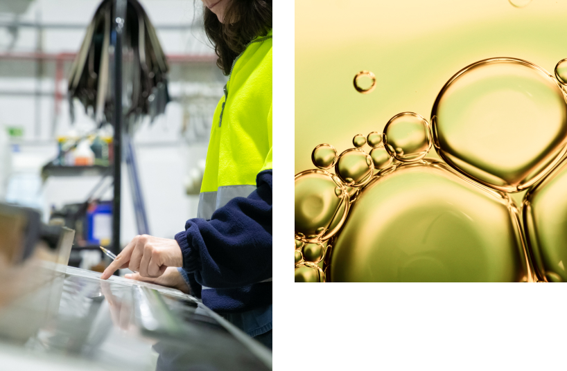 Operator monitoring a screen in an industrial environment with an image of biofuel bubbles in the foreground.
