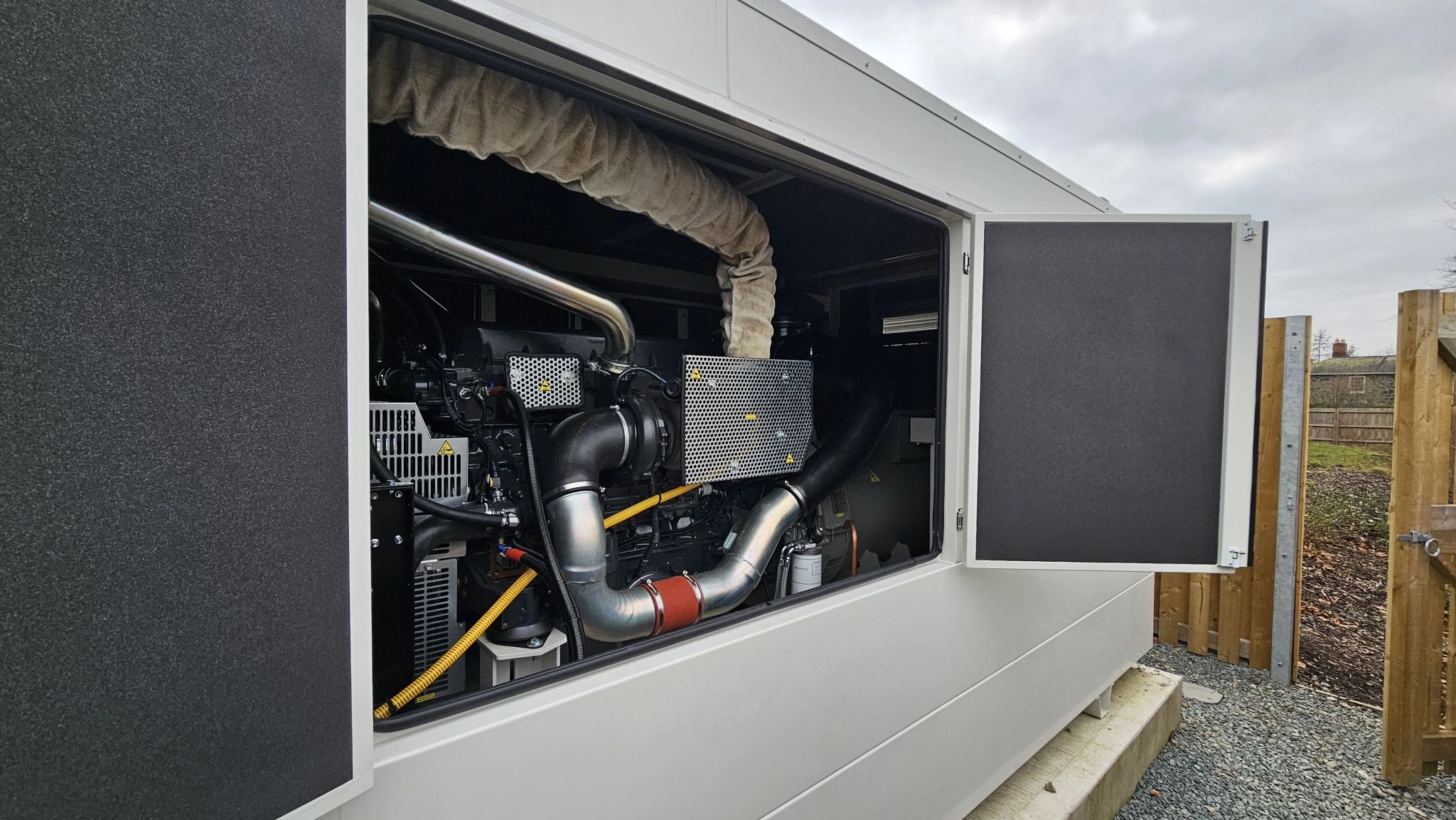 Genesal Energy generator installed outdoors at an industrial facility in the UK